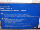 Cartello che specifica come arrivare al Neasden Temple