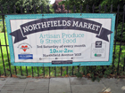 Il cartello che pubblicizza Northfields Market