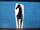 Il cavallo nero (blackhorse), che dà ìl nome all'area, riprodotto sulle piastrelle della metropolitana (opera di Hans Unger)